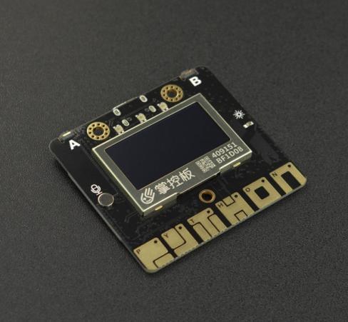 图 3-2 掌控板 2.0 实物：正面为 1.3 英寸 OLED 屏与 A/B 按键，板上左右两侧各三个金色圆点即为六路金手指触摸键